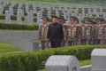 김정은원수님께서 조국해방전쟁승리 64돐에 즈음하여 조선인민군 지휘성원들과 함께 조국해방전쟁참전렬사묘를 찾으시였다